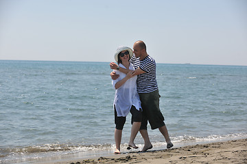 Image showing happy young couple have fun on beach