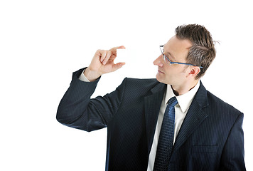 Image showing young businessman with empty white card