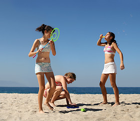 Image showing Girls playing on the beach