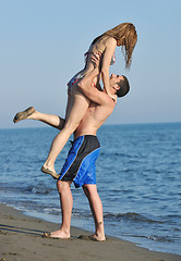 Image showing happy young couple have romantic time on beach