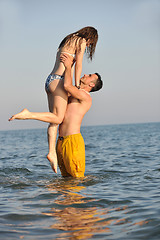 Image showing happy young couple have fun on beach