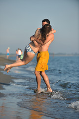 Image showing happy young couple have fun on beach