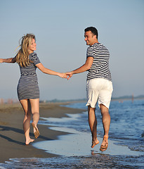 Image showing happy young couple have romantic time on beach