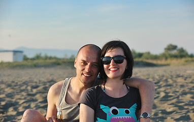 Image showing happy young couple have fun on beach