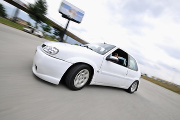 Image showing Fast car moving with motion blur