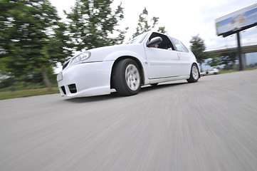 Image showing Fast car moving with motion blur