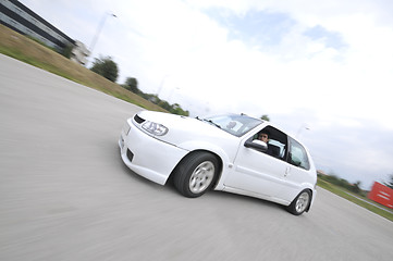 Image showing Fast car moving with motion blur