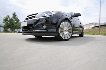 Image showing Fast car moving with motion blur