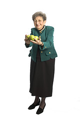 Image showing senior woman with apple