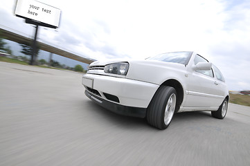 Image showing Fast car moving with motion blur