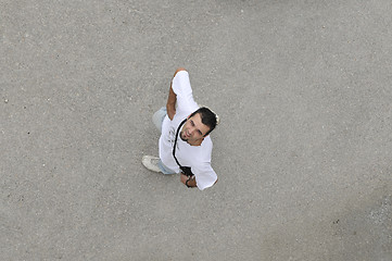 Image showing young man looking up