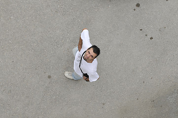 Image showing young man looking up