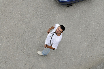 Image showing young man looking up