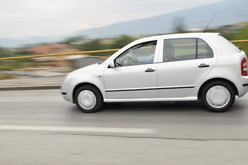 Image showing Fast car moving with motion blur