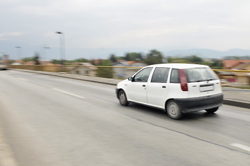 Image showing Fast car moving with motion blur