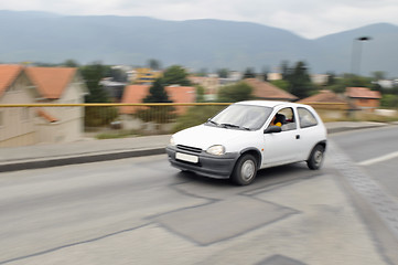 Image showing Fast car moving with motion blur