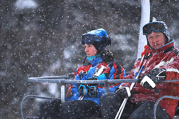 Image showing winter fun on a chair lift