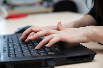 Image showing woman hands typing on laptop keyboard