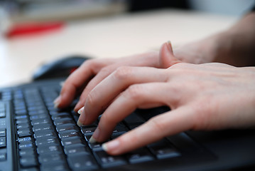 Image showing woman hands typing on laptop keyboard