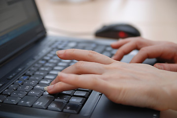 Image showing woman hands typing on laptop keyboard