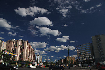 Image showing traffic in the city and blue sky with dramatic clouds