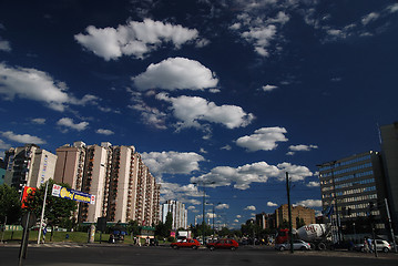 Image showing traffic in the city and blue sky with dramatic clouds