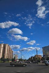 Image showing traffic in the city and blue sky with dramatic clouds