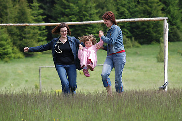 Image showing happy girls running in nature