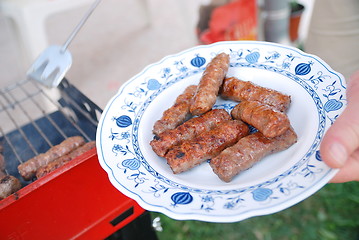 Image showing sausages on grill