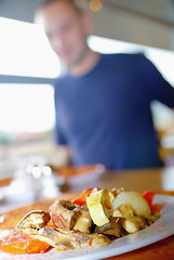 Image showing man eating healthy food it an restaurant