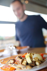 Image showing man eating healthy food it an restaurant