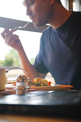 Image showing man eating healthy food it an restaurant