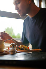 Image showing man eating healthy food it an restaurant