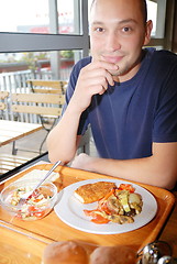 Image showing man eating healthy food it an restaurant