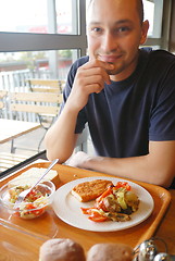 Image showing man eating healthy food it an restaurant