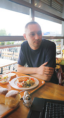 Image showing man eating healthy food it an restaurant