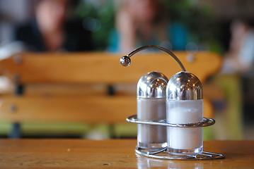 Image showing salt and paper shaker in restaurant