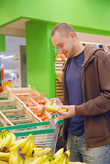 Image showing smiling man in supermarket