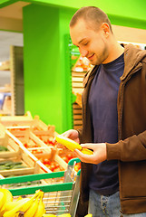 Image showing smiling man in supermarket