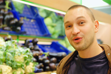 Image showing smiling man in supermarket