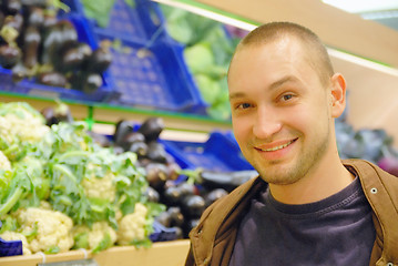 Image showing smiling man in supermarket