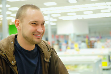 Image showing smiling man in supermarket