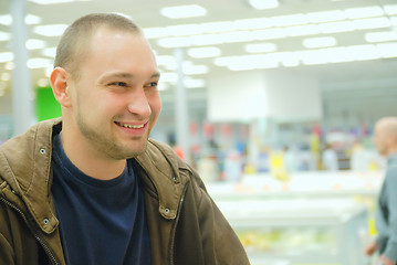 Image showing smiling man in supermarket