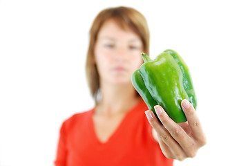 Image showing pretty girl with pepper isolated