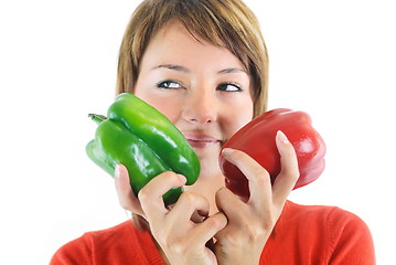 Image showing pretty girl with pepper isolated