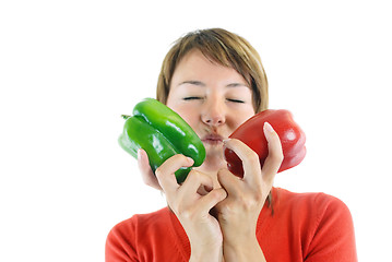 Image showing pretty girl with pepper isolated