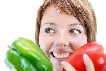 Image showing pretty girl with pepper isolated