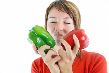 Image showing pretty girl with pepper isolated