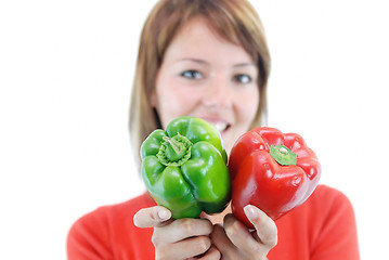 Image showing pretty girl with pepper isolated