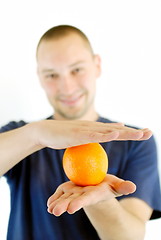 Image showing man with orange